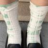 Plants tie-dye socks in green_Plant-dyed socks green