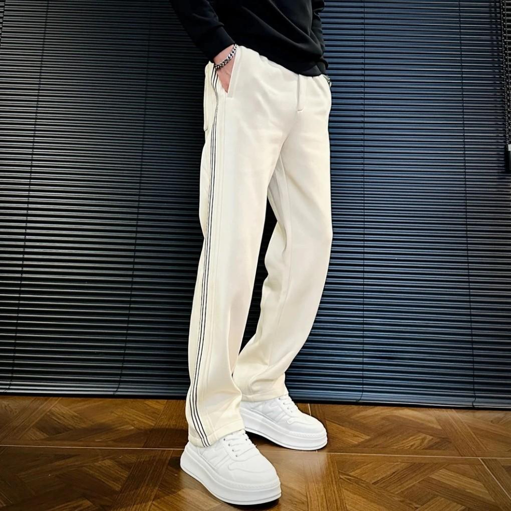 Autumn and winter senior sense splicing striped straight sports casual pants men's loose light luxury simple long-guard pants
