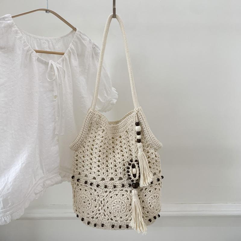Fashion hollow crochet pocket new holiday style beach shoulder messenger bag