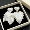 Elegant French Petal Pearl Heart Tassel Earrings – Light Luxury Retro Studs for Women