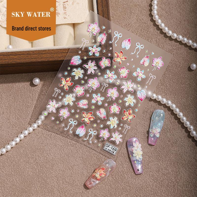 

Стикеры для маникюра в отпускном стиле: 3D-лилии и листья с бантами и сердечками