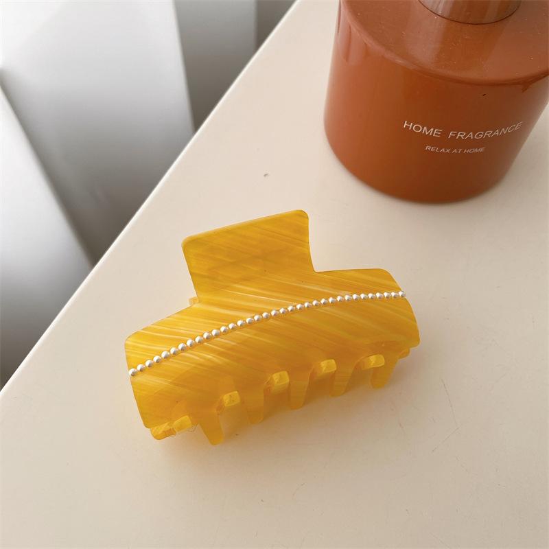 Trendy Elegant Hair Claw Clip For Women In Acetate With Pearl Accents For Style Everyday