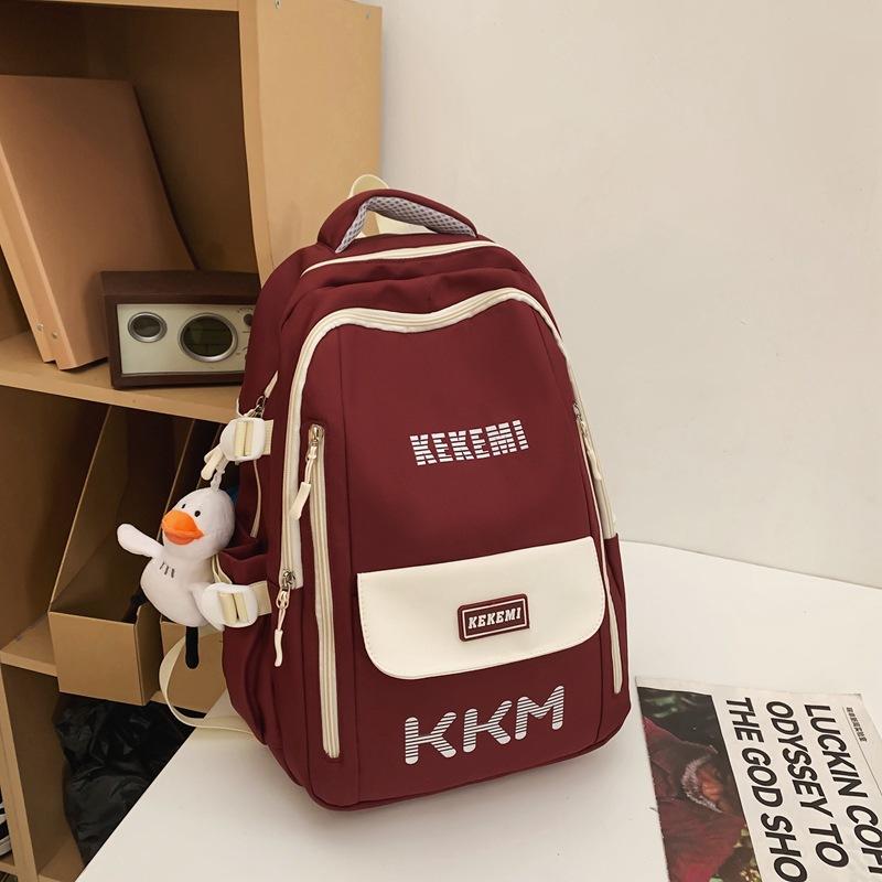 

Student schoolbag spring new large-capacity color matching alphabet literary Harajuku style junior and high school backpack
