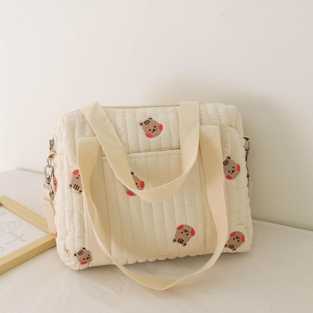 Geborduurde en gewatteerde mummie-tas met ritssluiting: Luiertas met ophanglus voor aan de kinderwagen, ideaal voor op reis.