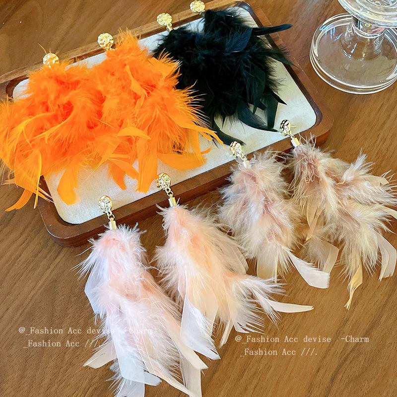 Silver needle super fairy artificial pearl feather earrings Bohemian retro exaggerated earrings niche new exquisite earrings