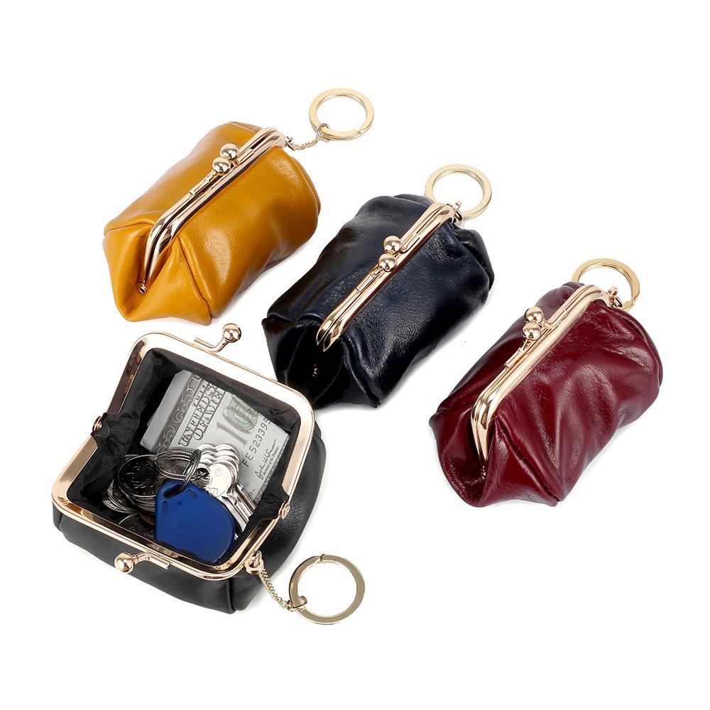 Retro clip change bag women's European and American, first layer oil wax cowhide Ins small earphones coin bag storage bag