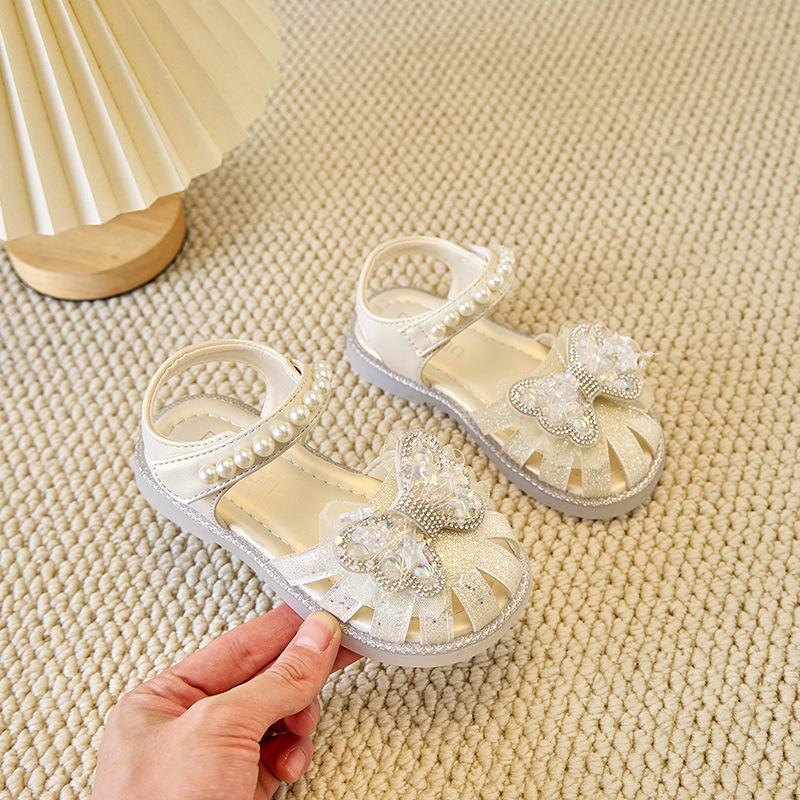 Scarpe da Spiaggia per Bambina Traforate Traspiranti Scarpe da Principessa per Bambini Dolci Fiocchi a Stella 2025 Nuove Estive Sandali per Bambini Perline Ins Trend