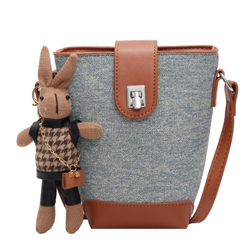 This year's popular niche design contrasting color temperament bucket bag women's casual versatile fashion commuter style messenger bag