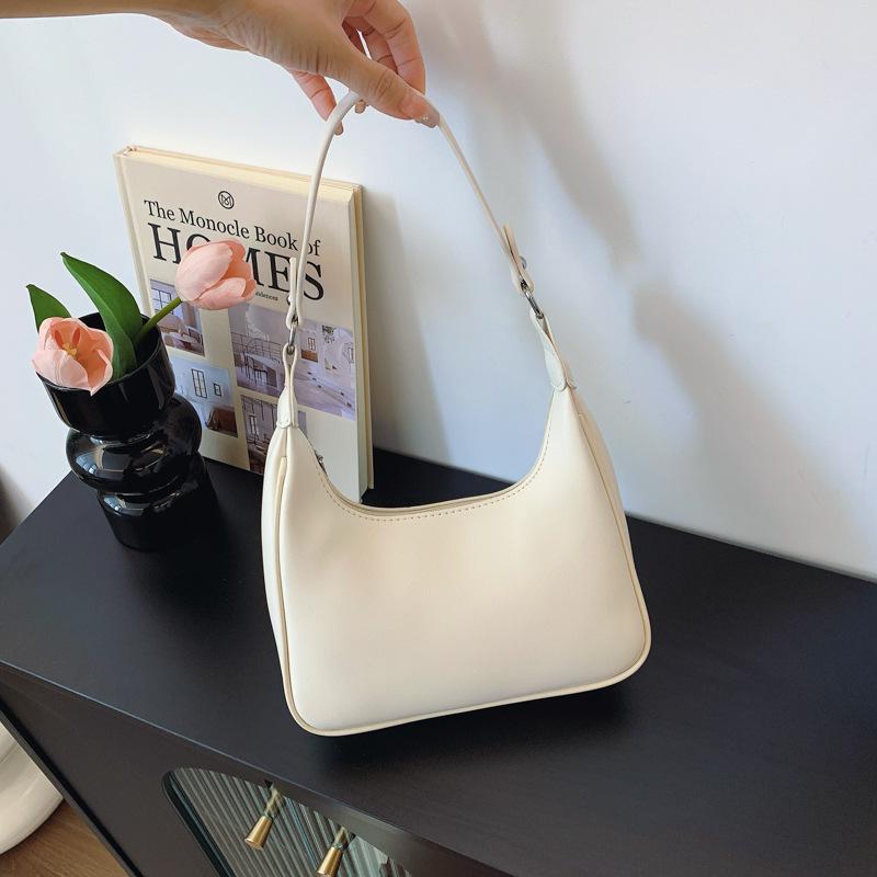 

2025 Женская нишевая мода сумка-пельмень - Универсальная на одно плечо через плечо белый