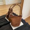 Fashion new bucket bag women's niche Korean version versatile shoulder bag retro commuter suede handbag