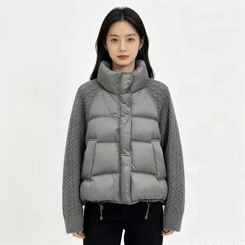 European and American knitted sleeves splicing down jackets women's short winter fashion stand-up collar warm white duck down tops are popular