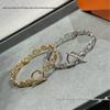 European & American 18k Rose Gold Plated Pig Nose OT Buckle Bracelet with Diamonds and Star Design for Women