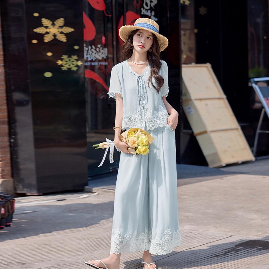Fashion temperament casual suit women's summer new temperament lace splicing light top wide leg pants two-piece set