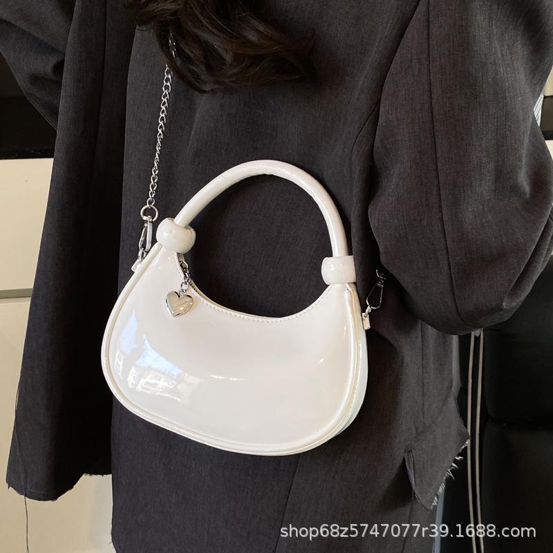 Hand-held Fashion Trend Dumpling Bag Women's 2025 New Simple and Versatile Patent Leather Shoulder Bag Niche Design Crossbody Bag