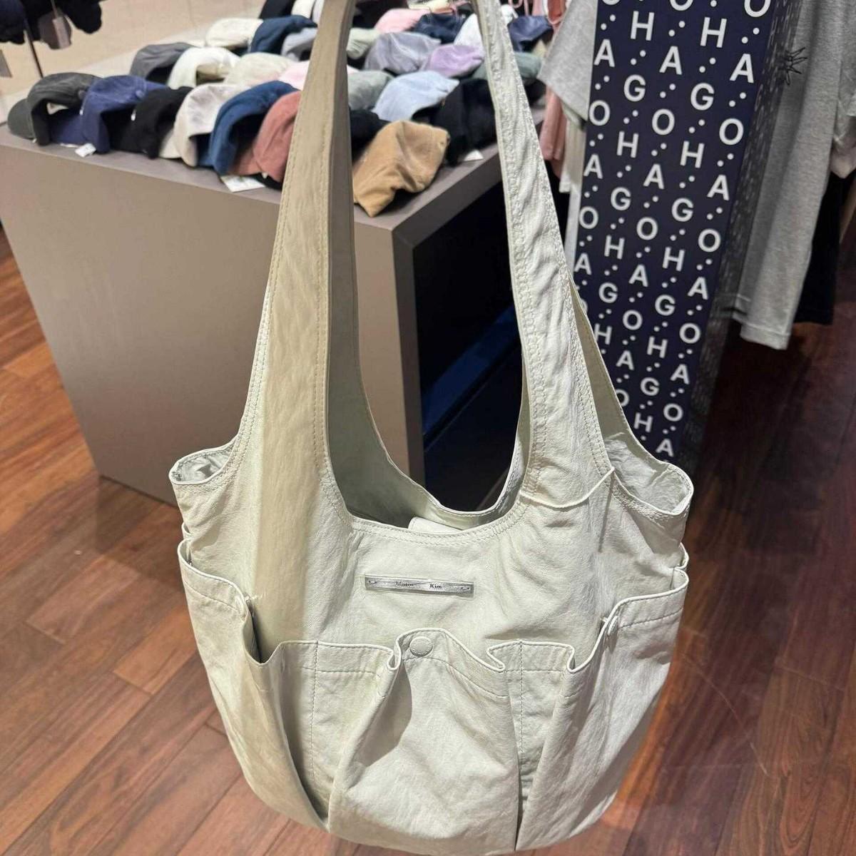 Schoolbag Women's Korean Niche Matin Kim Pleated Double Pocket Shoulder Tote Bag Nannan Same Korean Commuter Armpit Bag