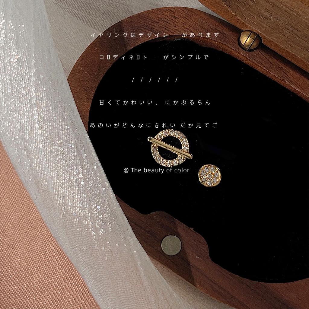 

Micro-set zircon asymmetrical mini stud earrings are versatile, individual, simple, design, planetary, geometric, petite earrings