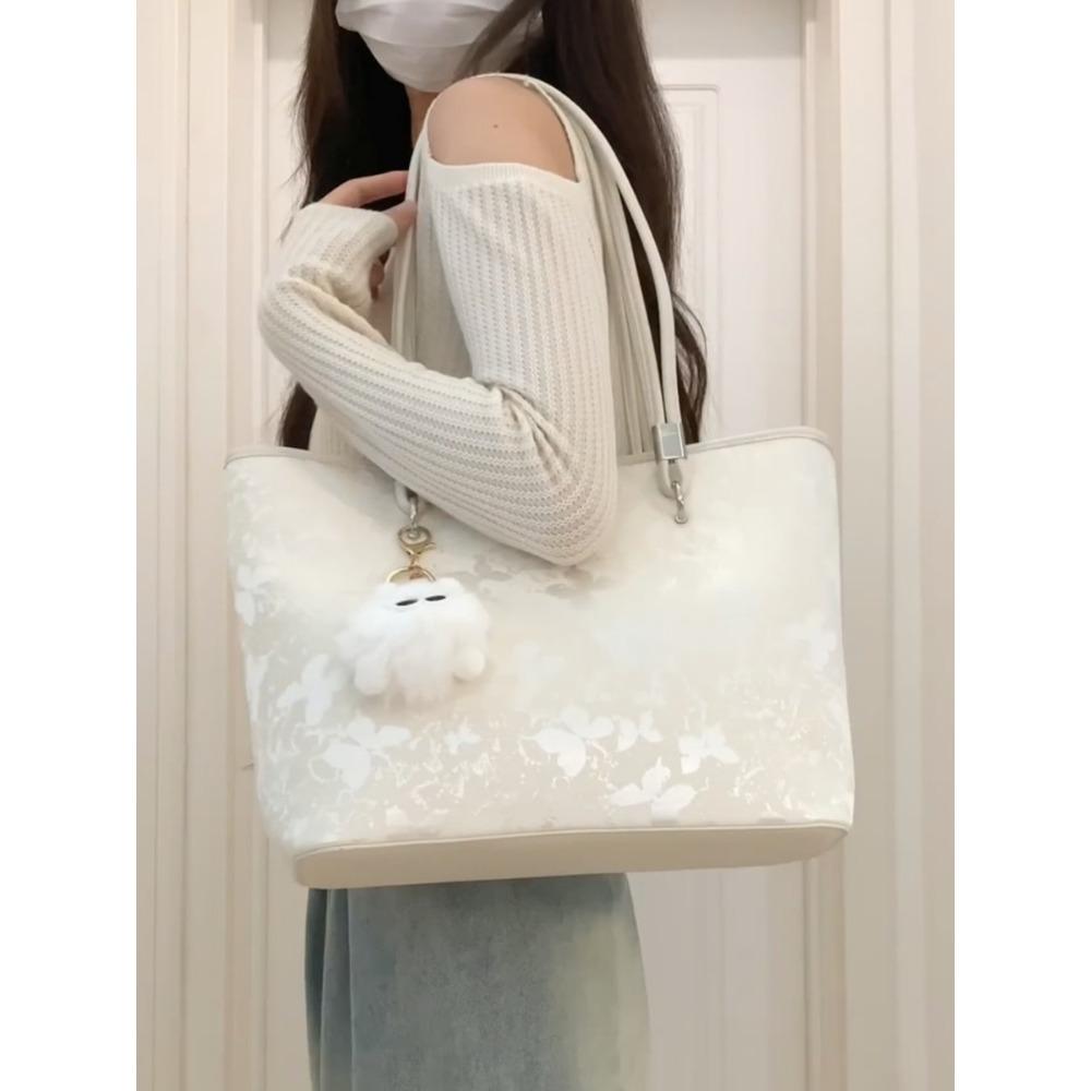 

2025 новая сумка-тоут женская летняя универсальная большая сумка сумка через плечо женская для поездок на работу модная большая вместимость сумка под мышку