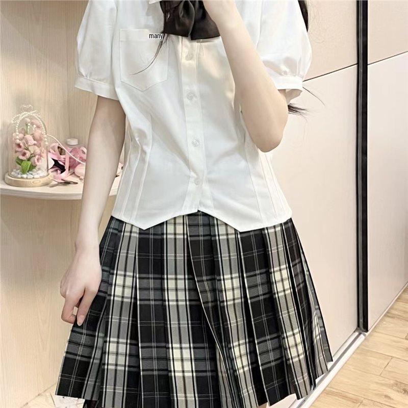 Wszechstronna spódniczka mini w czarno-białą kratę JJK Influencer na przybory szkolne - Dostępna, Blackboard News Cos