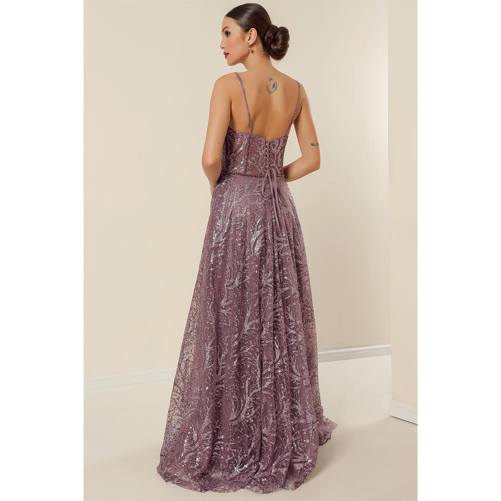 Langes Kleid mit Seilriemen und Perlen, gefüttert mit Pailletten und Glitzerbügeln