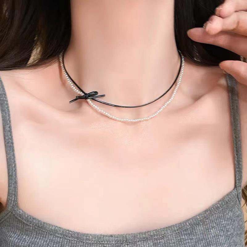 Double bow pearl necklace female design sense Spice girl sweet cool wind neck chain new choker leather rope with jewelry