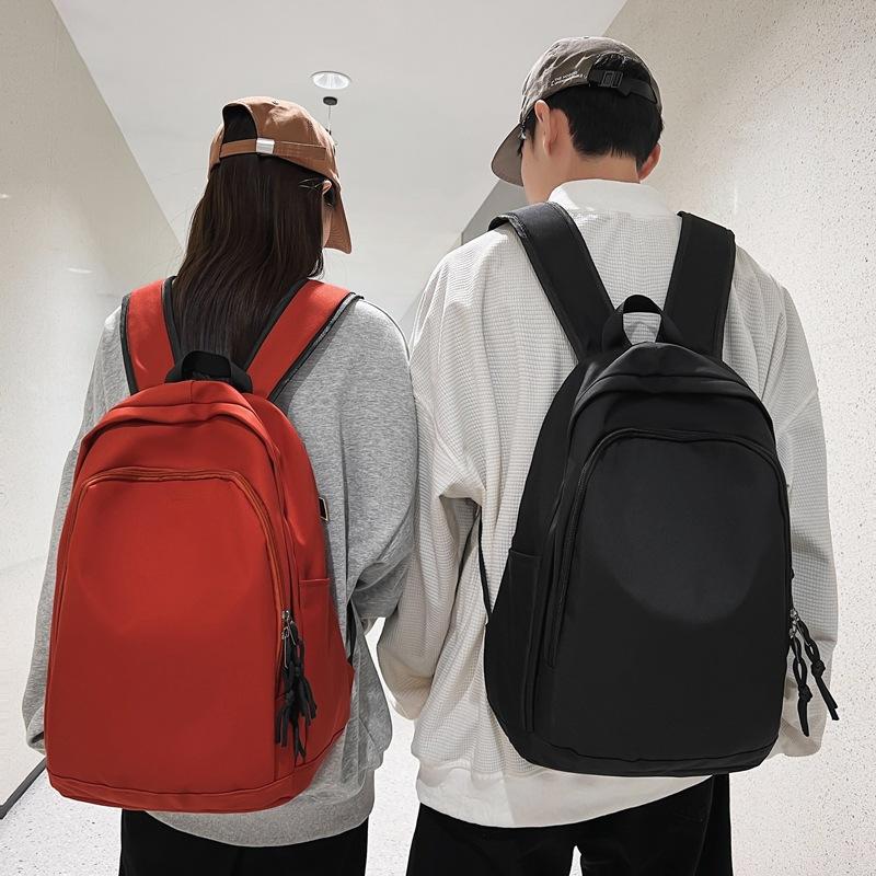 Spring new college style solid color student schoolbag Korean version large-capacity junior high school backpack