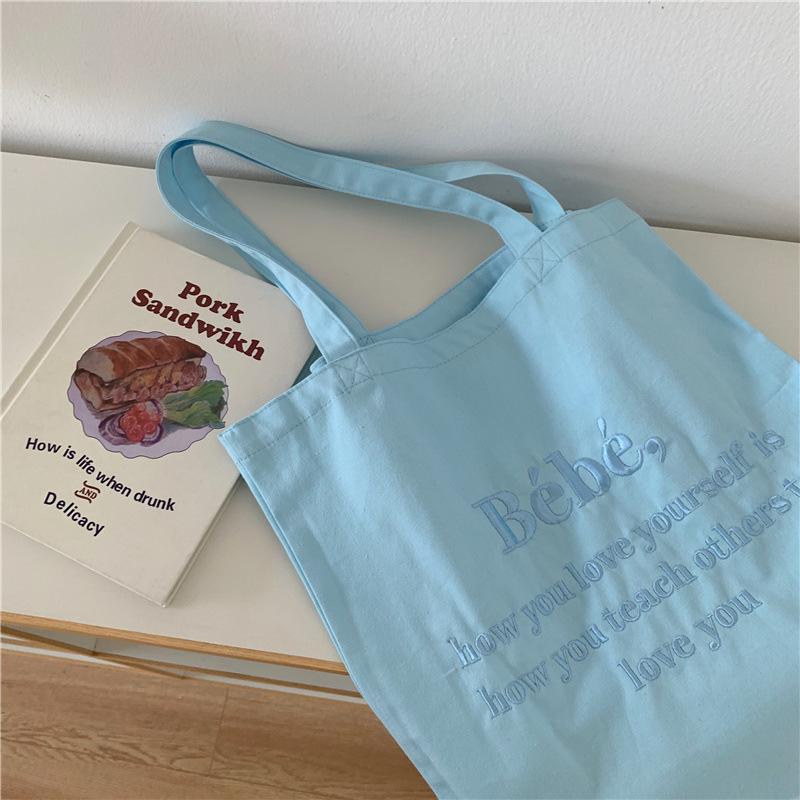 [Sofort lieferbar] Koreanische Bebe-Buchstaben-Stickerei auf Canvas-Tasche ins Koreanische Macaron-Studenten-Umhängetasche