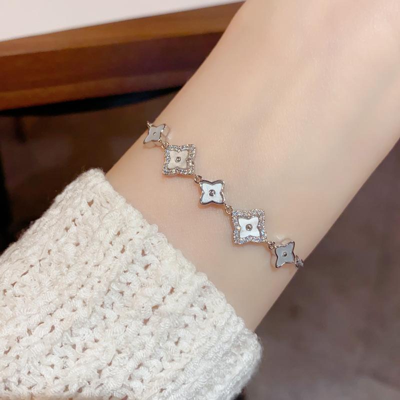 Micro-Set Zirconia Shell Temperament Adjustable Pull-Out Bracelet Female Niche Light Luxury Design Sense Four-Leaf Clover Bracelet Hand Jewellery