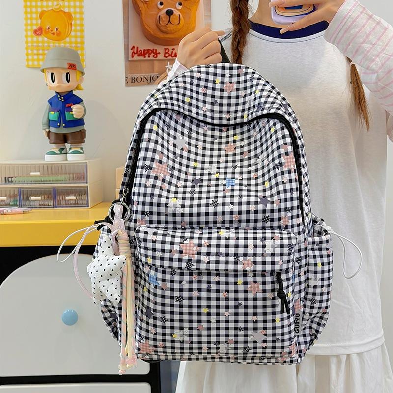 Schoolbag new schoolbag female junior high school student star printing Korean version niche ins backpack Mori college student computer bag