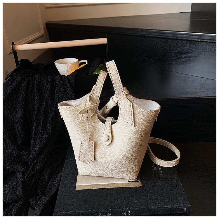 Wholesale 2025 new niche lychee pattern handbag bag women's Korean version simple bucket bag casual messenger bag