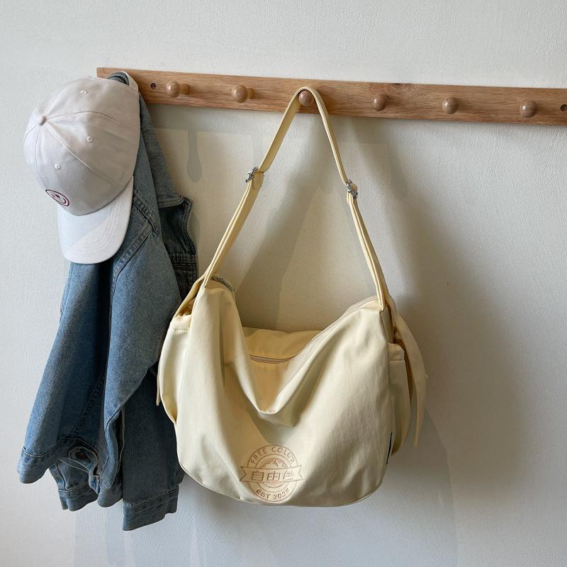 Casual large-capacity canvas bag women's 2025 new trendy commuter versatile shoulder messenger bag slack tote bag