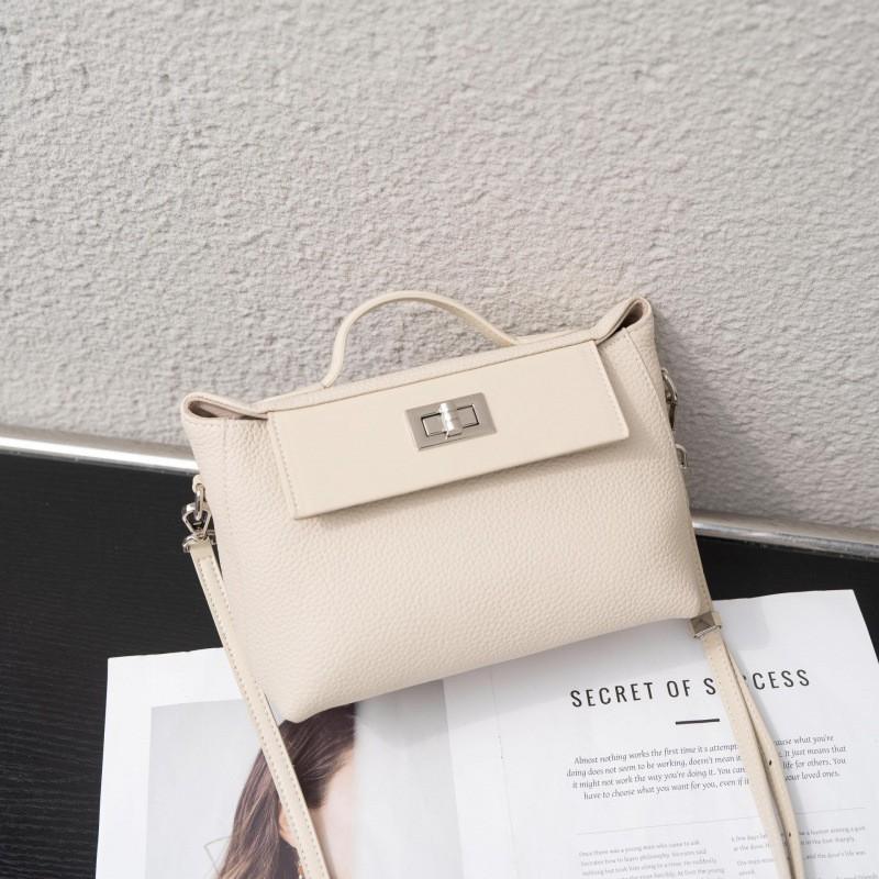 All-matching Retro Design Top-layer Cowhide 2026 Lock-up Fashionable Casual Commuting Portable One-shoulder Cross-body Bag