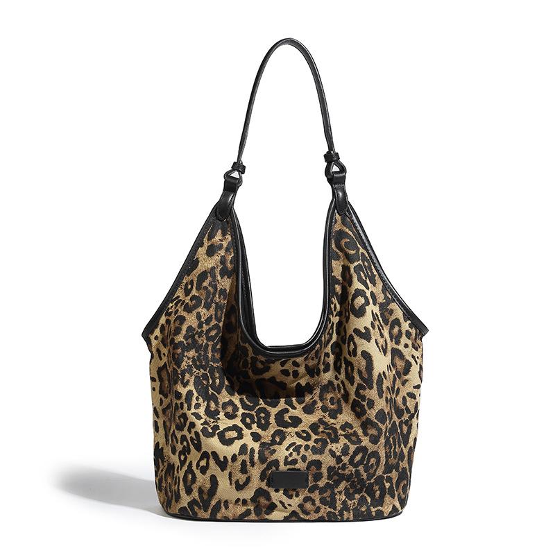 

Дорога сумка з леопардовим принтом 2024, нова універсальна ретро-мішка для приміських поїздок під пахвами