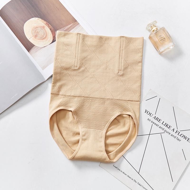 

Женские бесшовные трусики с высокой талией для контроля живота, послеродовой коррекции таза - Сотовые утягивающие талию и приподнимающие бедра шортики M/L (100-125 Jin)