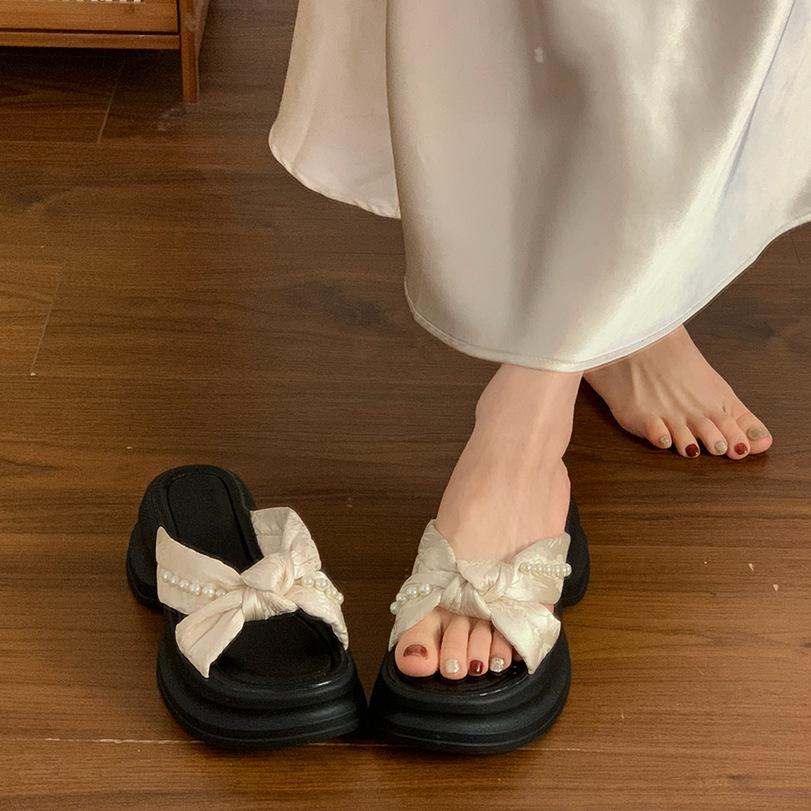 Pearl bow cool slippers women's summer wear new thick bottom heightening skirt beautiful beach one-word drag
