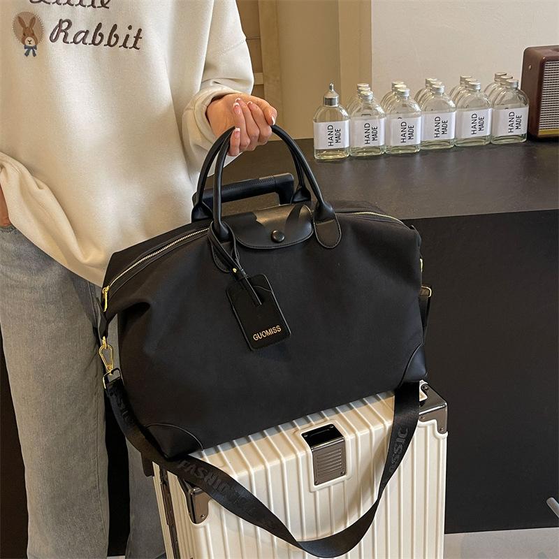 Travel bag Women's large capacity fashion lightweight short-haul luggage bag Portable outdoor portable fitness bag Birth storage bag