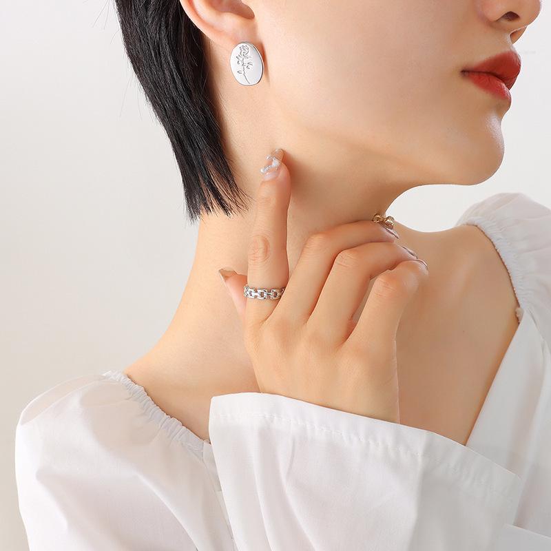 Retro Rose Embossed Titanium Steel Oval Earrings - Non-Fading, Unique Temperament