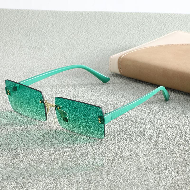 

1/2 шт. Безрамные солнцезащитные очки для женских солнцезащитных очков Новые высококлассные и модные Океанические цельные Острые края 6669 зелёный
