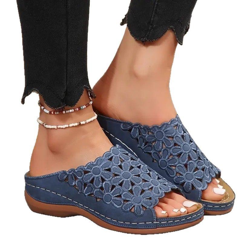 Foreign trade large size 2025 summer new simple casual flower hollow PU medium heel women's wedge heel slippers