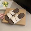 Flat-bottomed slippers women's summer outer wear 2025 new simple casual lazy seaside vacation wind one-word beach shoes