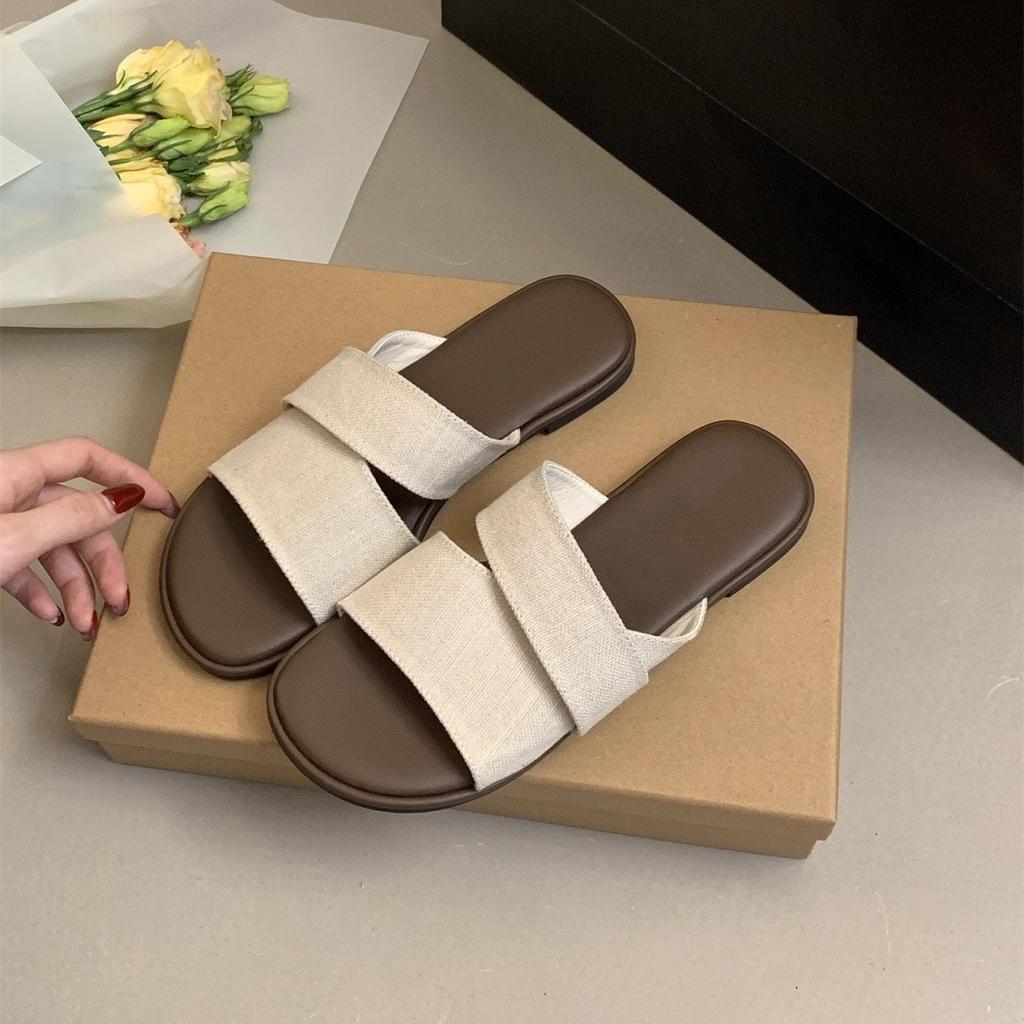 Flat-bottomed slippers women's summer wear new simple casual lazy seaside vacation wind one-word beach shoes