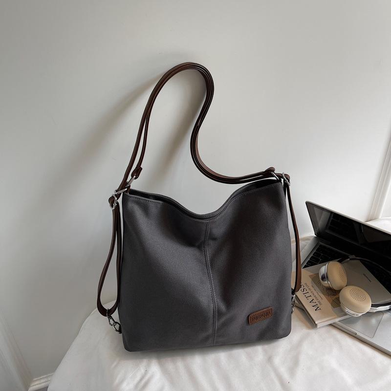 Sac femme nouveau grande capacité sac à dos de trajet sac bandoulière sac décontracté multi-port pour sortir