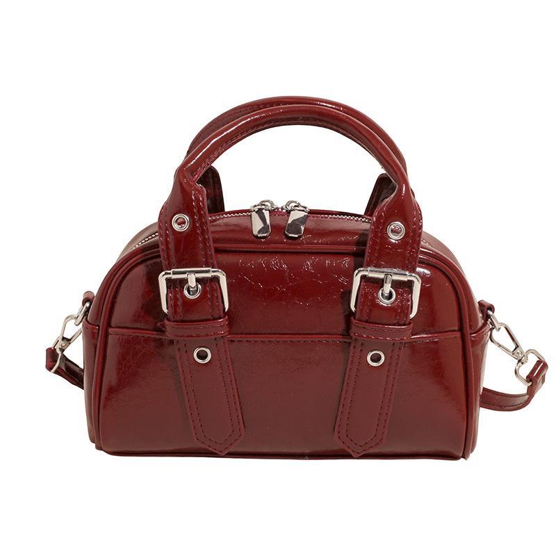 Niche design retro locomotive style personalized portable Boston bag women commuter versatile high sense foreign style messenger bag