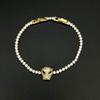 Luxuriöses Damenarmband mit Schmetterlings-Zirkonia und Leopardenkopf - Funkelnder High-End-Stil