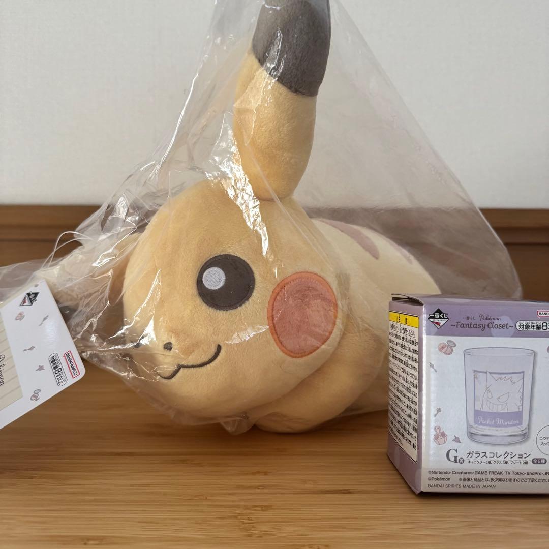 New and unopened  Pikachu stuffed toy and glass collection
