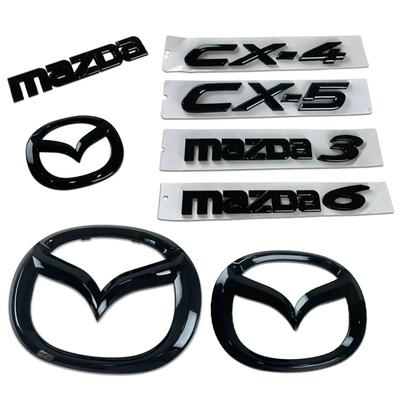 Plastikowy emblemat przedniego bagażnika samochodu Dekoracja tylnego błotnika do Mazda 3 6 CX-4 CX-5 Naklejka 3D na kierownicę