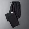 Męskie spodnie casualowe ze ściągaczem w pasie i modnym wzorem Harlan Pants Sportowe luźne spodnie w jednolitym kolorze