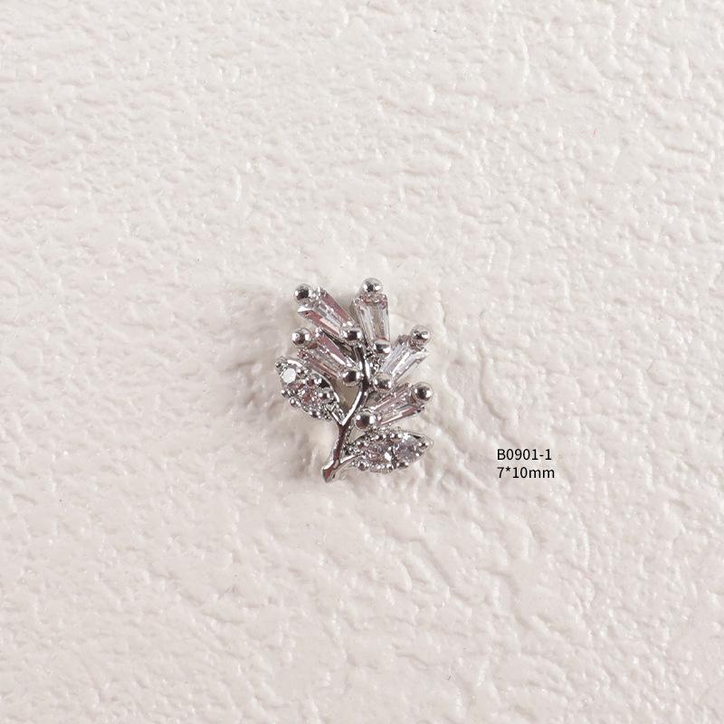 Trendiger Strass- und Zirkon-Nagelschmuck mit diamantbesetzten Metallpailletten