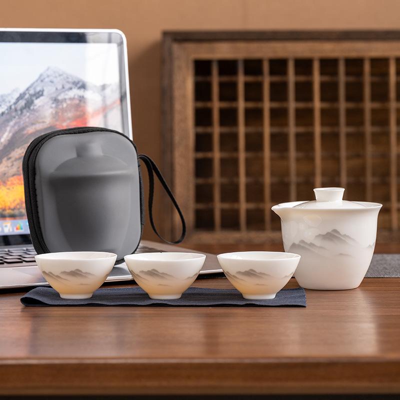 Suet jade porcelain high-end travel tea set, a pot of three cups, portable set, light luxury business commemorative holiday gifts