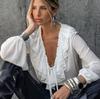 Spring and summer new loose V-neck lace-up ruffle edge long-sleeved shirt women's European and American fashion simple temperament commuter women's 