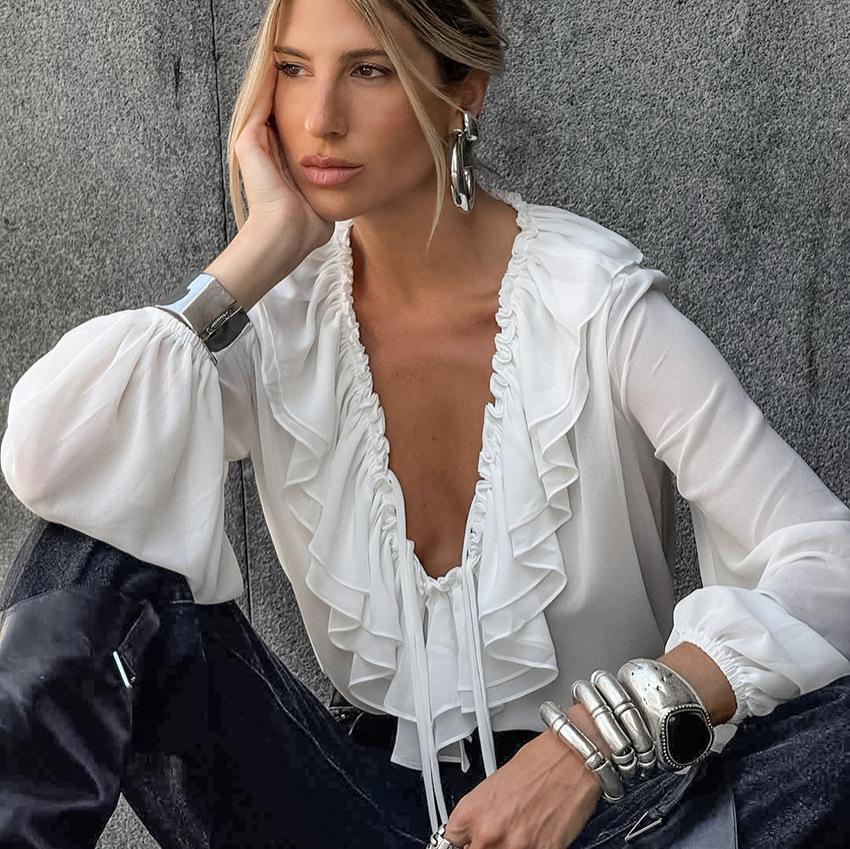 Spring and summer new loose V-neck lace-up ruffle edge long-sleeved shirt women's European and American fashion simple temperament commuter women's 